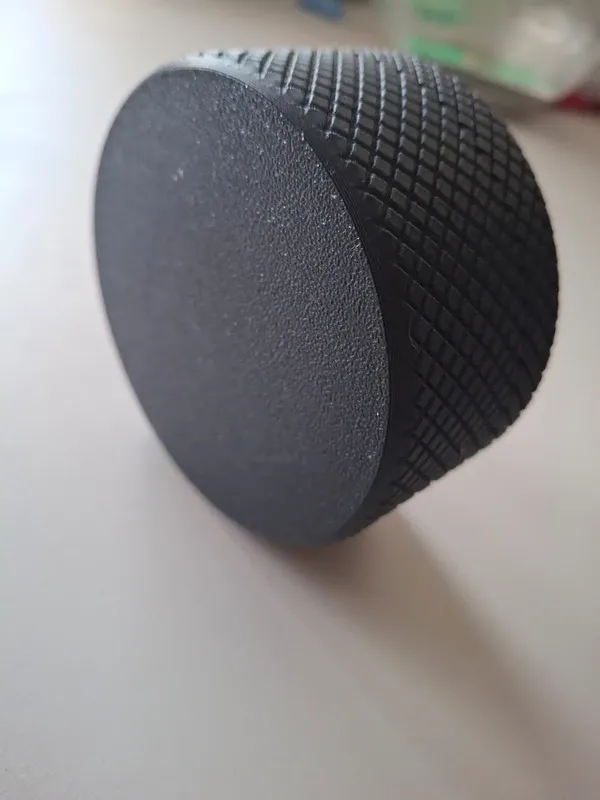 Plain black knurled jar lid
